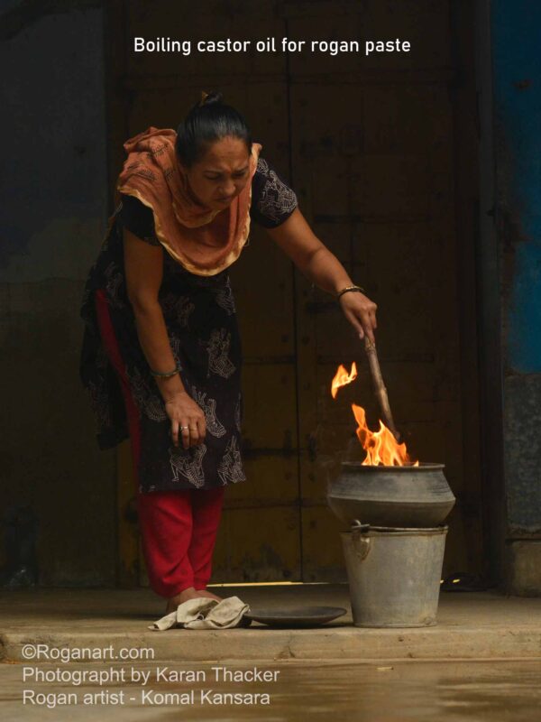 boiling castor oil for rogan paste By Komal Kansara from Madhapar